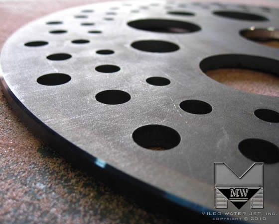 Titanium Disk Brake Rotor for Racing and Performance - Water Jet Cut by MILCO Waterjet Water Jet cut of Titanium Disk Brake Rotor for Racing and Performance by MILCO Waterjet, in Orange County, Southern California