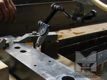 Advantages to Waterjet cutting - MILCO Waterjet - Setting up a part without mechanical stress