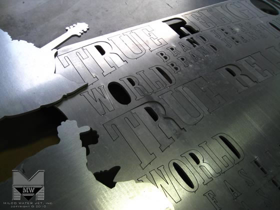 Water jet cutting custom signage for True Religion Brand Jeans - Retail Signage by MILCO Waterjet, in Orange County, Southern California